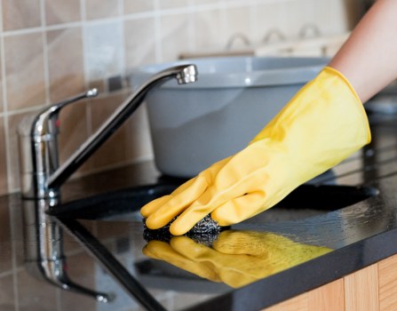 Trained cleaning staff working safely with protective gear